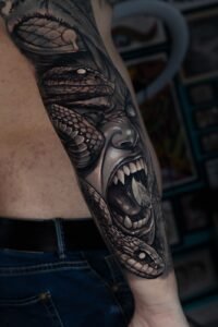 bryan tattoo artist balck and grey sleeve
