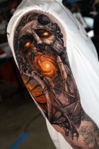 bryan tattoo artist balck and grey arm