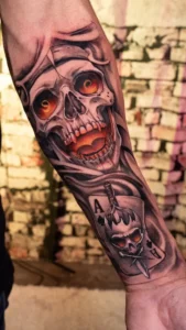black and grey skull on leg